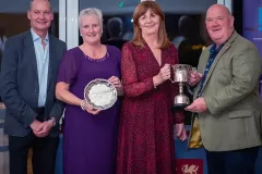 Robb and Nicola receiving The Thomas Davies Memorial Trophy for The Best Wine in the competition. Presented by Lesley Griffiths MS Minister for Rural Affairs.